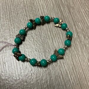 Turquoise Beaded Bracelet with Butterfly Accents